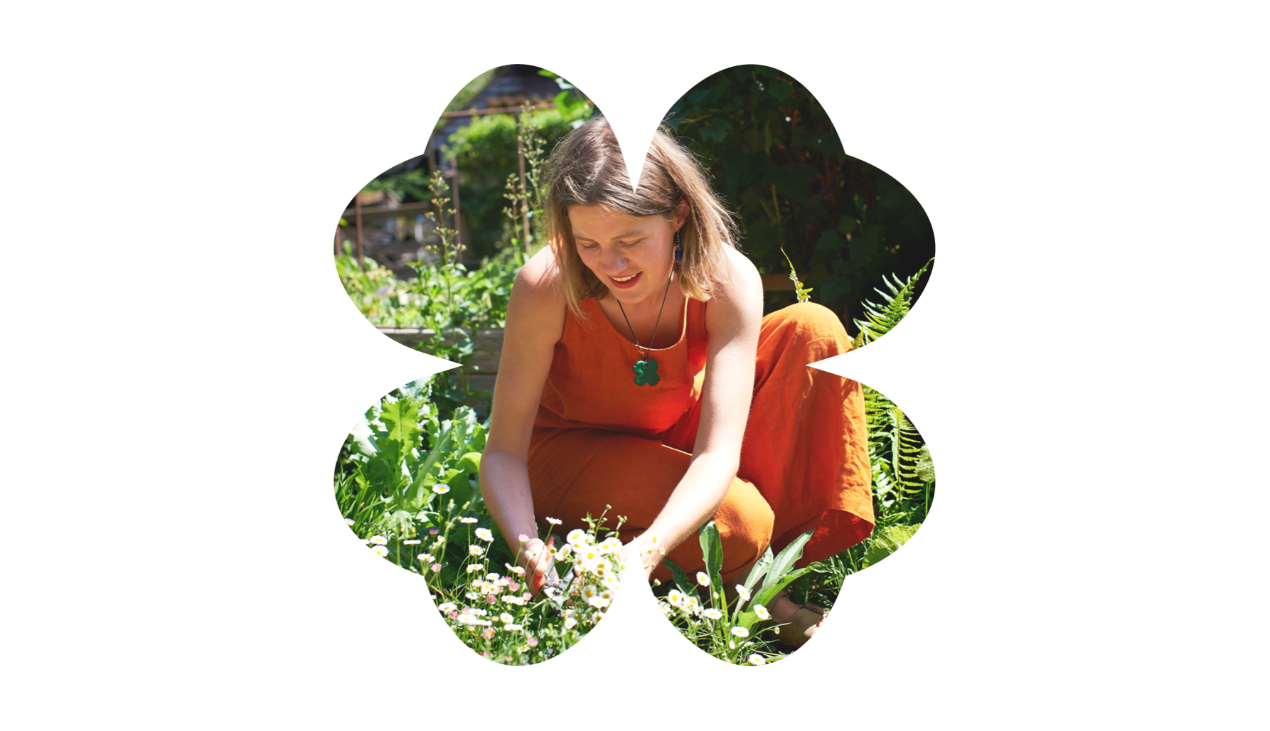 Ash picking flowers in the garden, framed in a clover shape