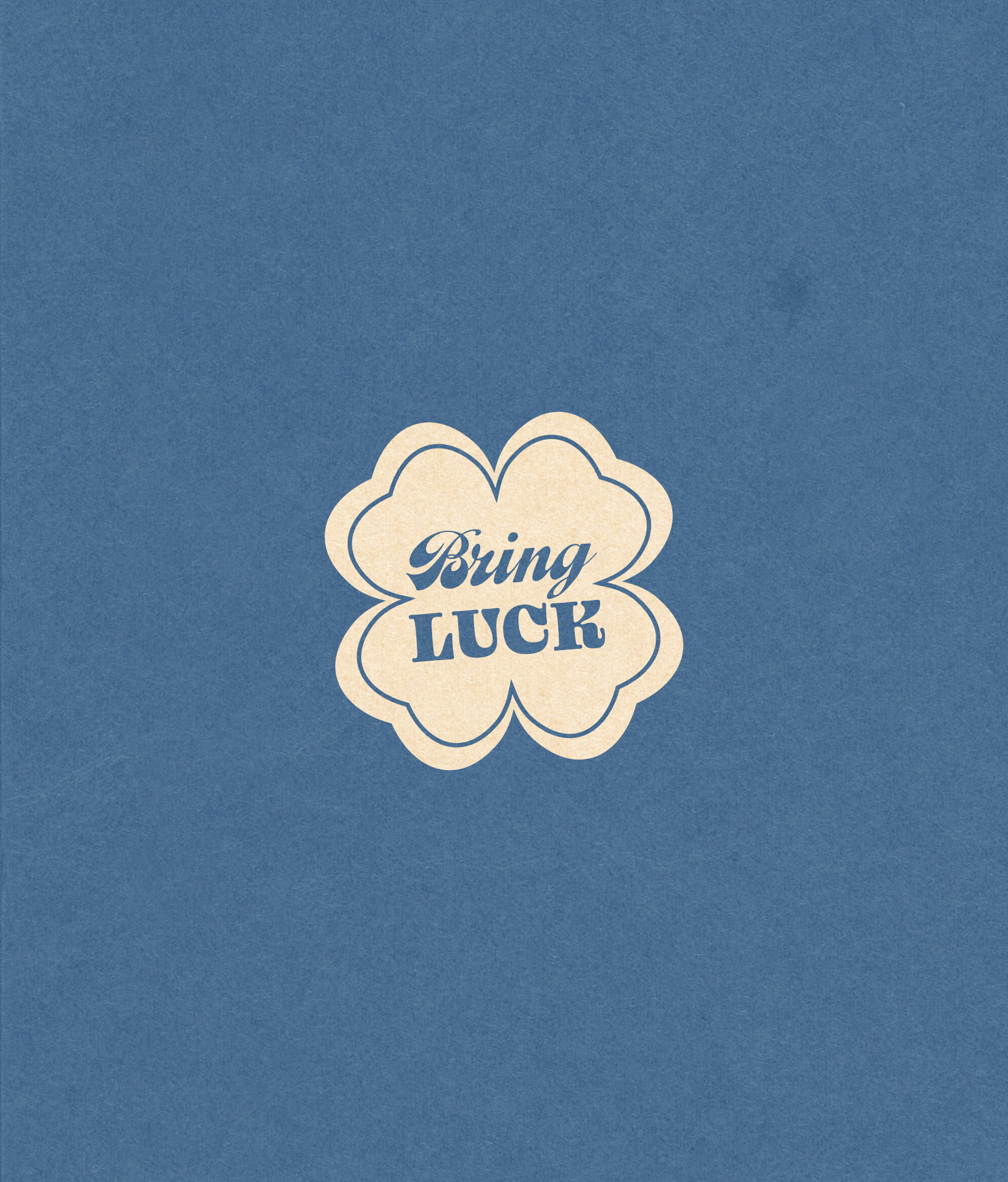 The Bring Luck submark, a clover shape lettered in blue on cream